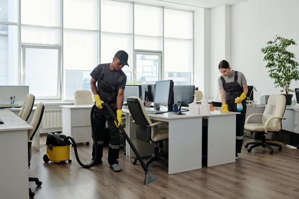 Brisbane commercial cleaning staff mopping office floor