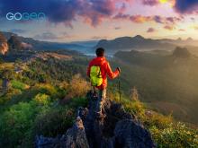 a traveler enjoying scenic beauty of Kerala