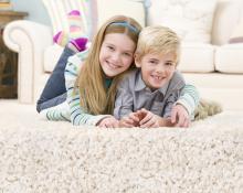 boy and girl on carpet after carpet cleaning in north richland hills tx