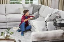 boy in living room after carpet cleaning in signal hill ca