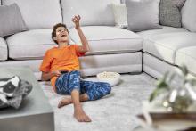 boy in living room after carpet cleaning in Anaheim CA