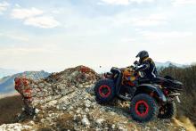 men-riding-go-kart-on-mountain