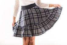 Discover the Plaid Skirts Comeback: 6 Outfits for Holiday Parties to elevate your festive wardrobe. See stylish ideas for your next holiday event.