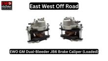 Pair of EWO GM Dual-Bleeder JB6 Brake Calipers (Loaded) R2236 showing silver cast iron housing, pre-installed semi-metallic pads, and ambidextrous bleeder screws for left or right side 14-bolt axle installation.