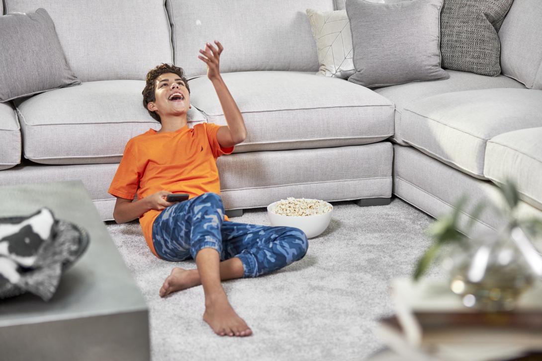 boy in living room after carpet cleaning in Anaheim CA