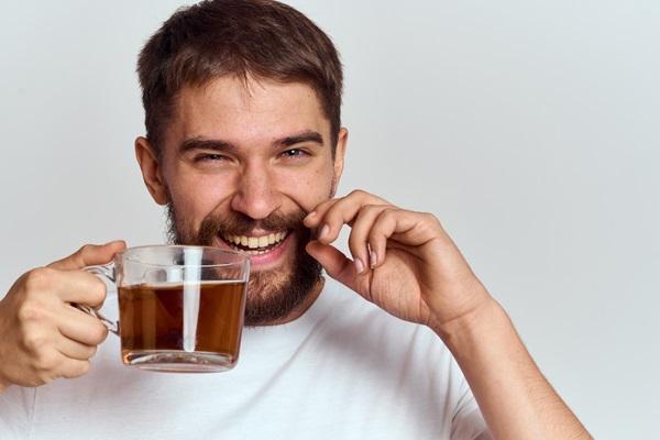 man drinking tea